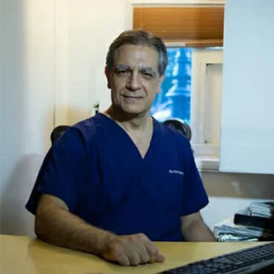 A headshot photo of Dr. Spyridon Condos of Dental Implant Center NYC